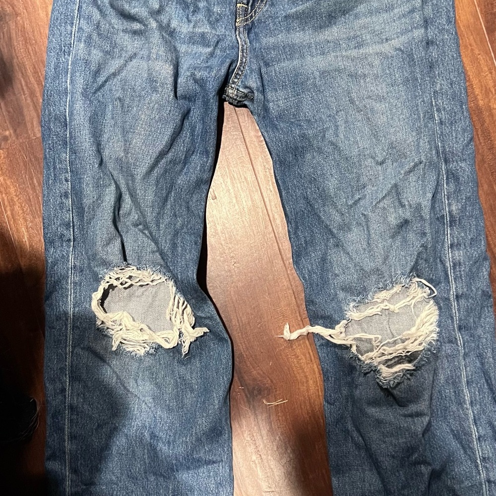 Levi's Classic Blue Denim Ripped Knee Jeans